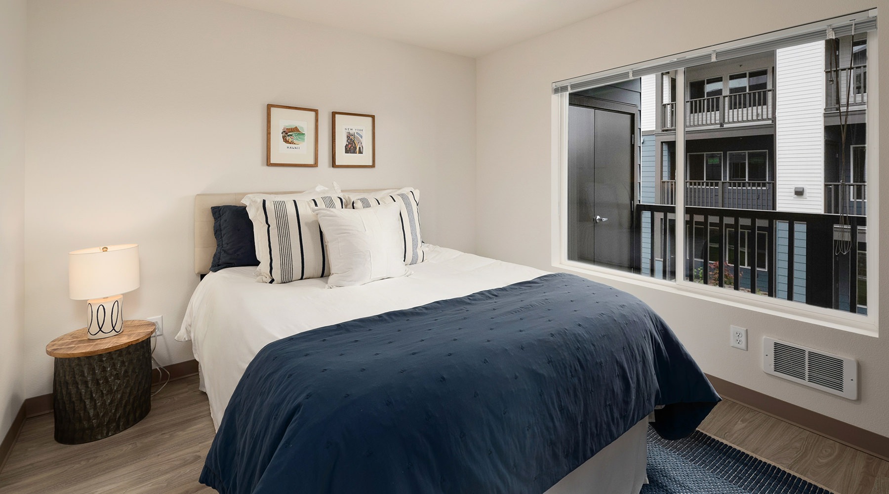 Bedroom of 2 Bedroom Unit bedroom with large windows